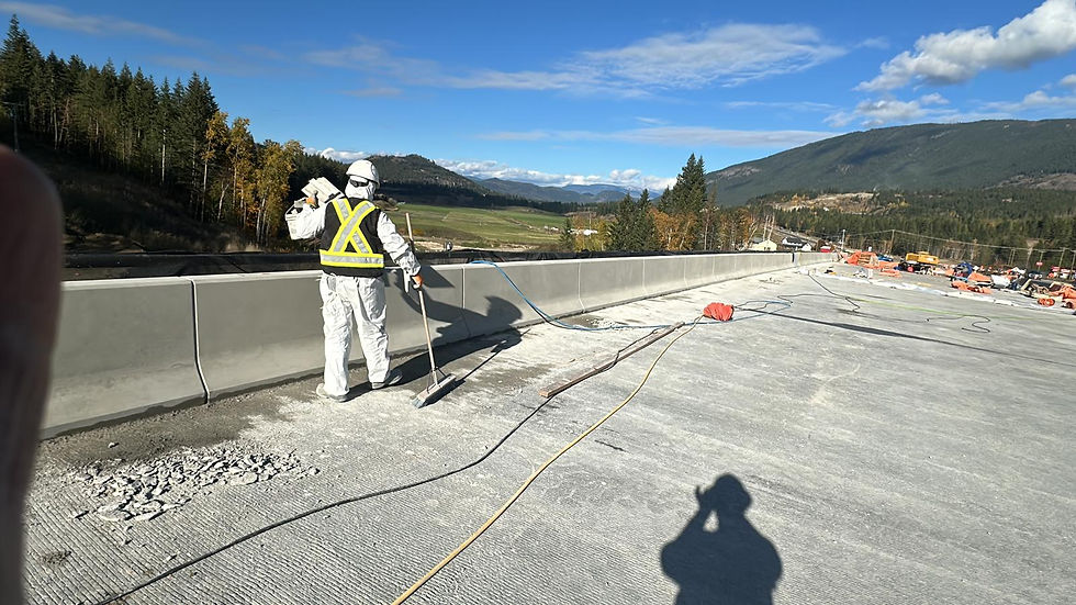 WLL Construction worker performing concrete surface finishing on a high-density infrastructure bridge project.