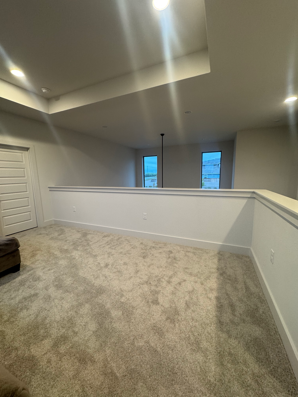 Modern staircase remodel • Custom railing installation • Horizontal railing system • Staircase renovation • Interior remodel • Luxury home renovation • Custom stair railing • Modern interior design • General contractor