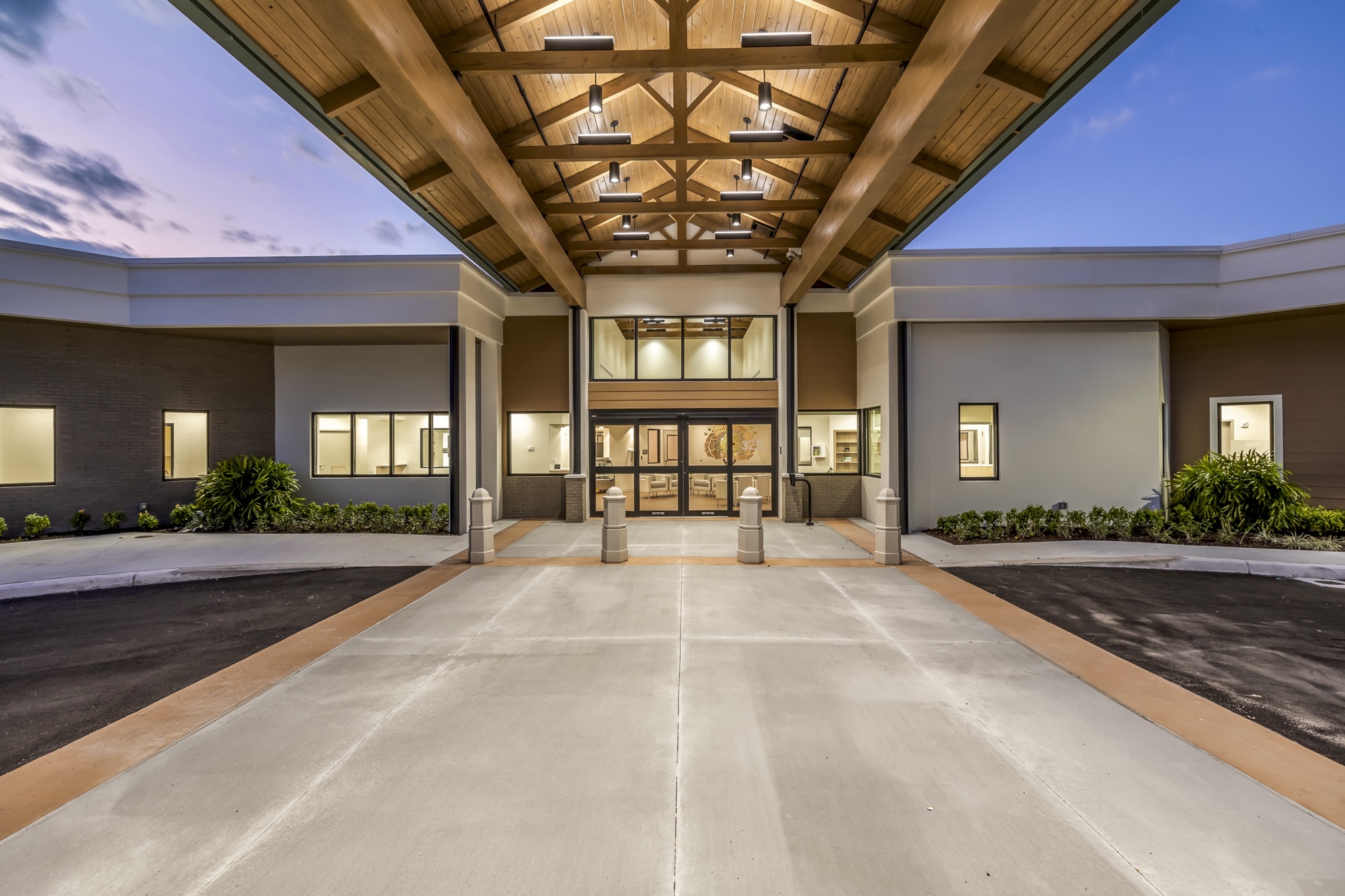 Sunset view of port-o-cochere at community center
