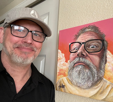 Painter Will Slaton with a portrait