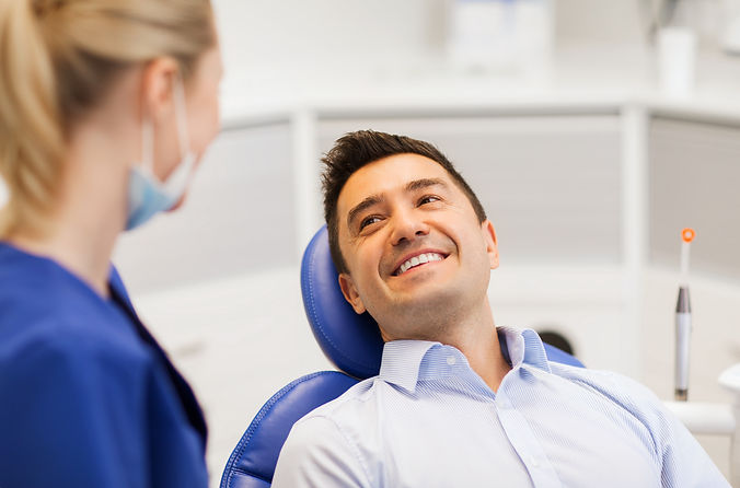 Man at dentist to get veneers