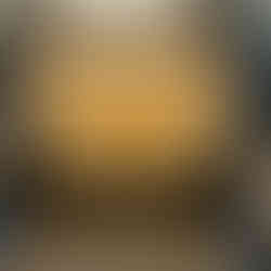 honey dripping from a beehive board in the process of cleaning the raw honey