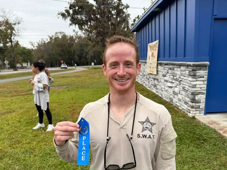 Yep, It’s Murphy Again: Reserve deputy wins first place in "Shop with a cop" benefit run, proving dedication doesn’t take days off.