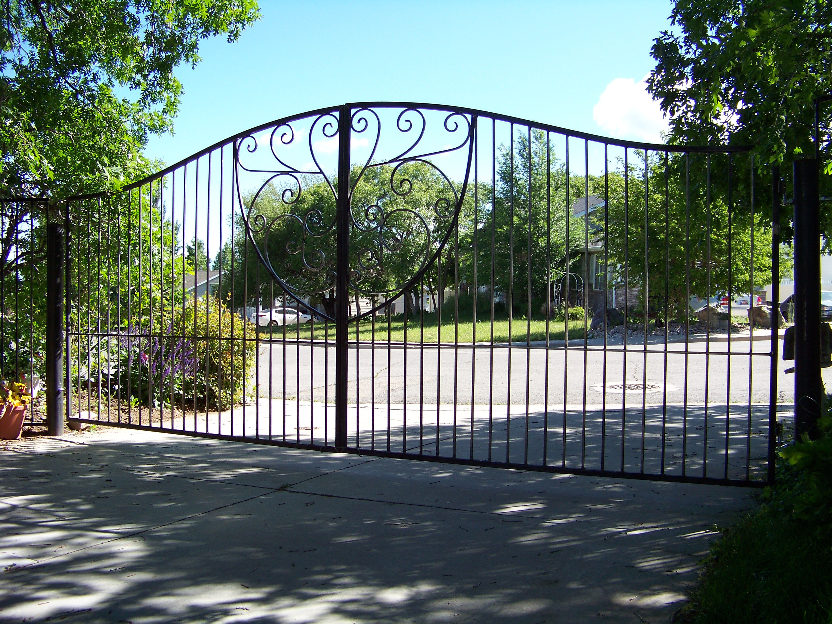 Custom Driveway gate 12' W X 6'H at center double swing # 218 D