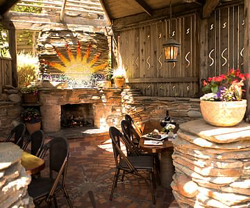 Rustic wood and stone featured in the dinning hall of Cambria Pines Lodge