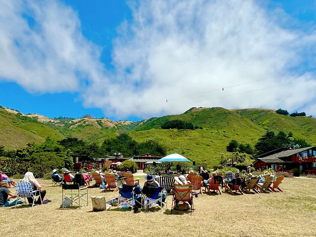 People enjoying a day at Ragged Point's shore