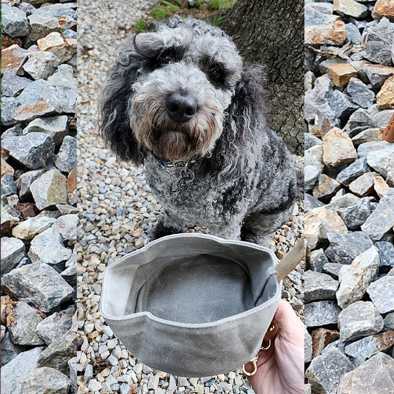 Thumbnail: Dog offered water from waxed canvas dog water bowl by Hendricks and Maple