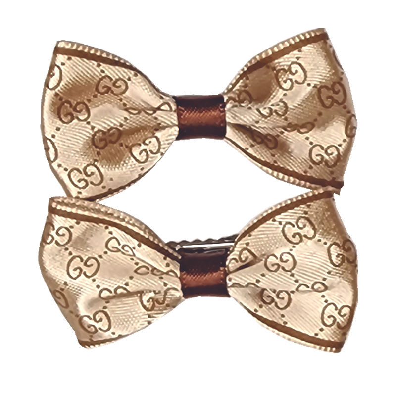 Thumbnail: Designer dog hair clip design in caramel pucci by Hendricks and Maple
