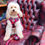 Thumbnail: Luna sitting on leather chair in tartan dog harness by Hendricks and Maple
