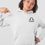 Thumbnail: Woman modelling a white Libra Zodiac and spiritual hoodie against a white background
