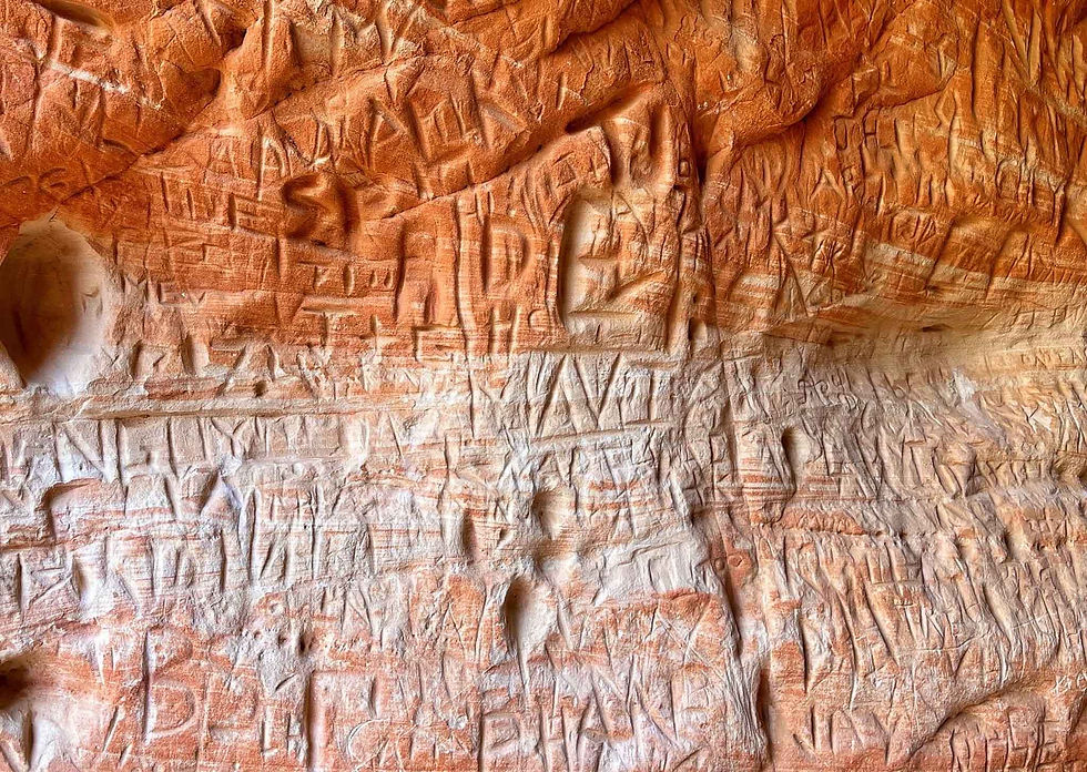 Lots of people have carved their names into the sandstone