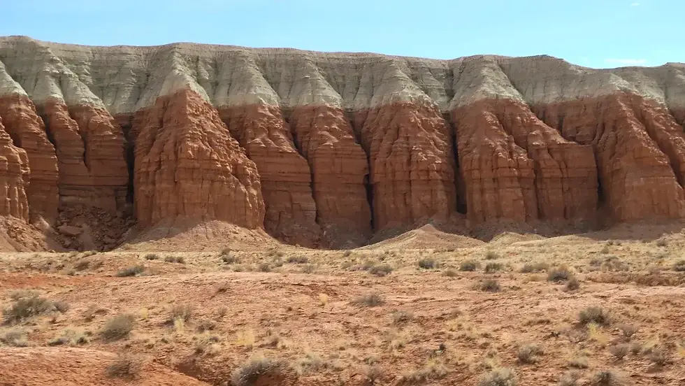 The butte at the far end of Goblin Valley
