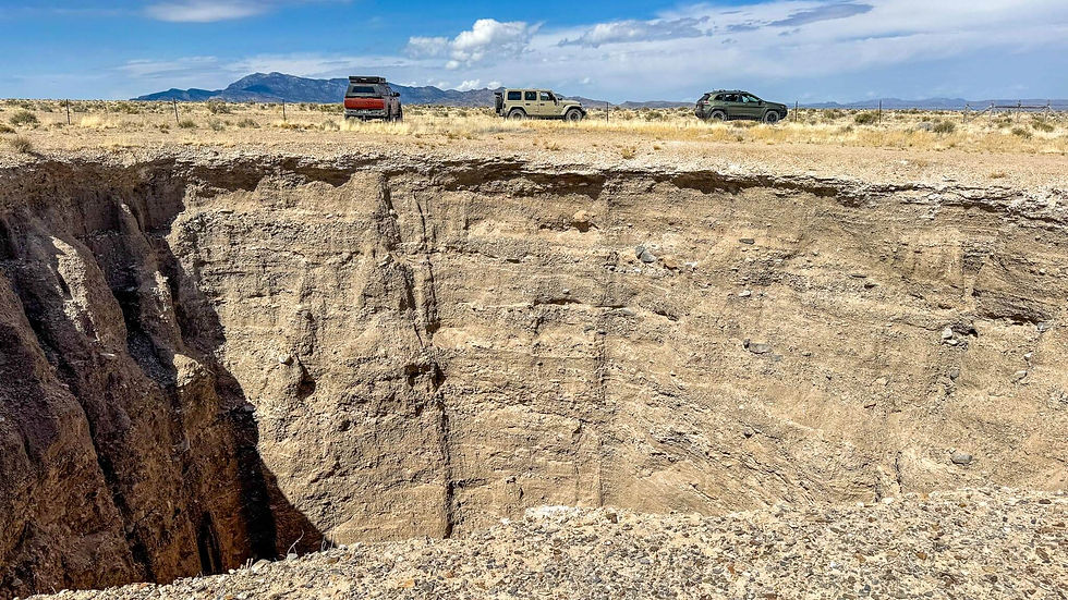 For scale, you can see our vehicles on the other side of the fence