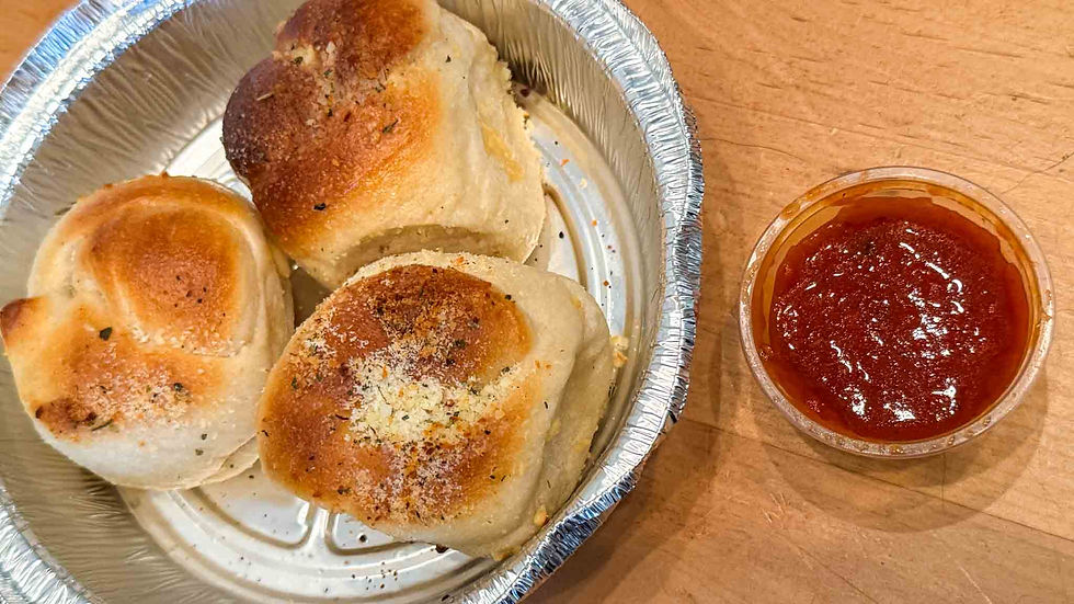 Just look at these garlic knots and marinara sauce
