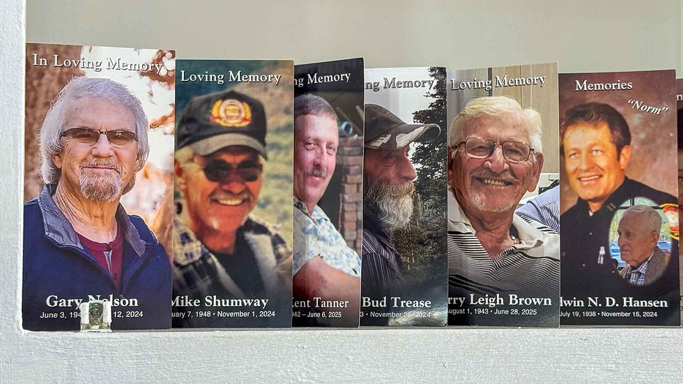Row of memorial cards with smiling older men, labeled In Loving Memory or Memories, including names like Gary Nelson and Mike Shumway.