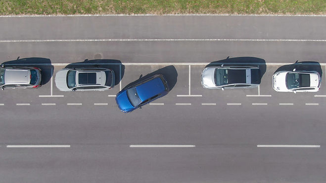 DRONE, TOP DOWN: Flying above a shiny bl