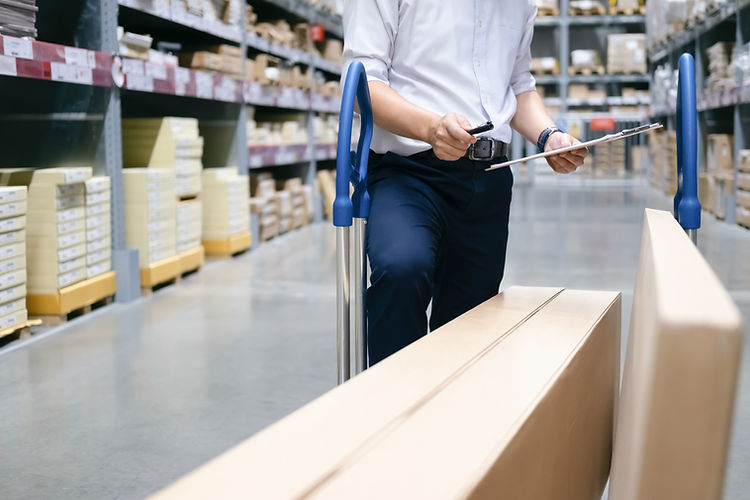 warehouse-worker-checking-goods-warehouse.jpg