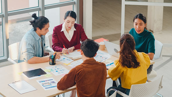 multiracial-group-young-creative-people-smart-casual-wear-discussing-business-brainstormin