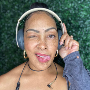 DJ Monie sticking her tongue out
