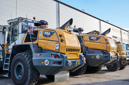 Diesel mechanics, high-visibility shirts, safety boots, tools, grease, machinery, workshops, parts, boardrooms, classrooms.  Liebherr excavator images, Liebherr machine photography, Liebherr earthmoving equipment Construction site with Liebherr machines Liebherr equipment in action