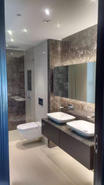 bathroom renovation completed by T2PSL in liverpool with marble tiles