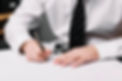 crop-elegant-man-writing.jpg