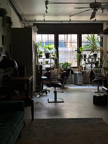 a picture of a beautiful back lit honey hive salon in chicago