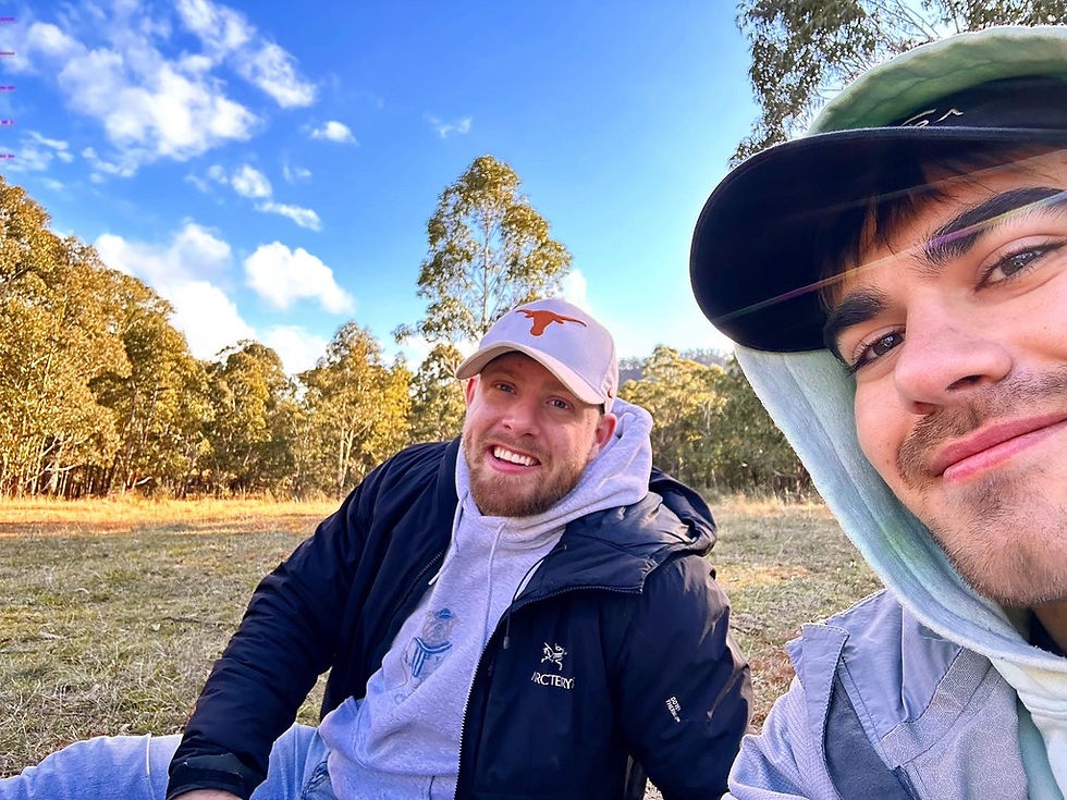 Quentin Geczy with friend outside