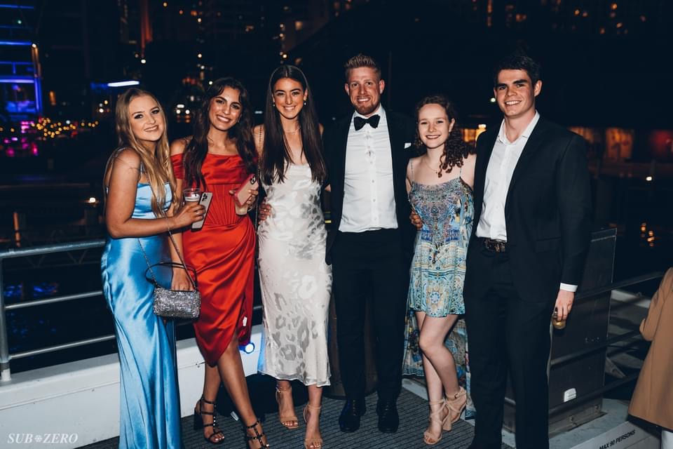 Quentin Geczy with group of friends dressed up