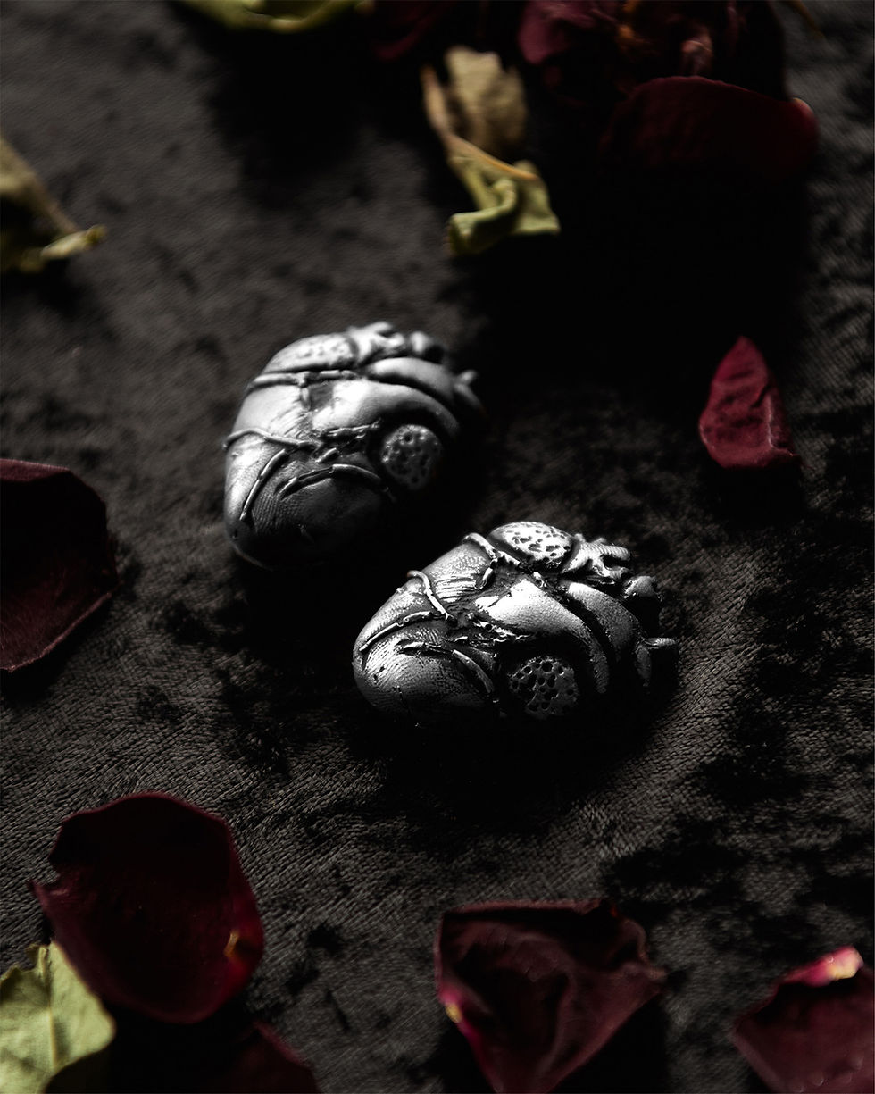 Thumbnail: A pair of anatomical heart magnets with a vintage-gold effect finish.