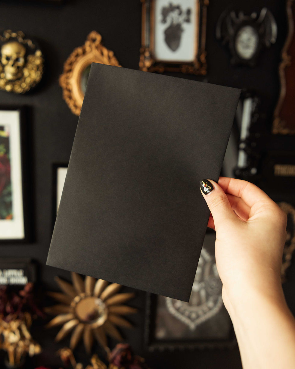 Thumbnail: Black C5 size envelope that is included with the card