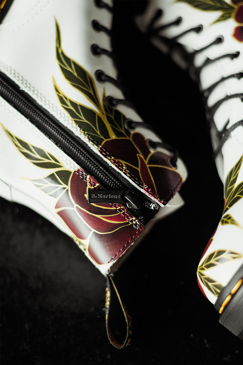 Thumbnail: A pair of white Dr Marten Jadons customised with neo-traditional style roses and leaves, outlined in gold.