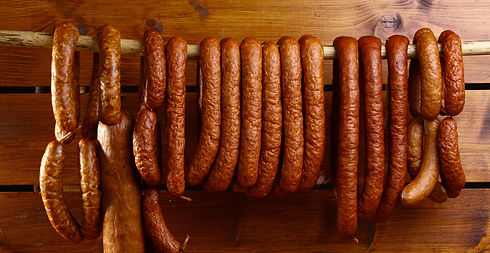 Sausage hanged on wooden background_edited.jpg