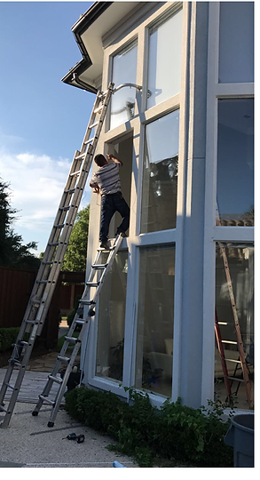 That's us in action - replacing a large window piece of glass on second level