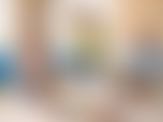 Child practising balance exercises indoors with parental support