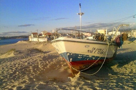 Boat on the beach near Trafaria