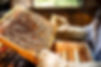 Beekeeper%20Holding%20a%20Honeycomb_edited.jpg