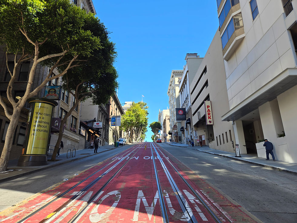 Red colored cable car tracks on Powell Street