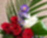 Aster mauves avec des roses rouges et un lys blanc