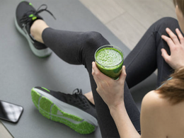 Woman enjoys a functional beverage for joint health after working out.