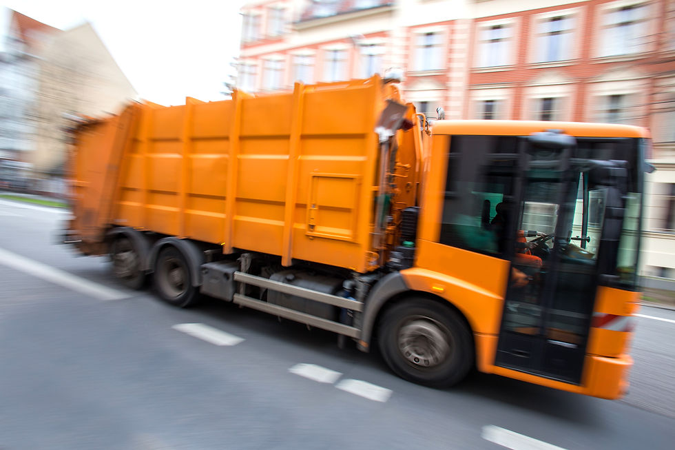 garbage collection truck speeding in the