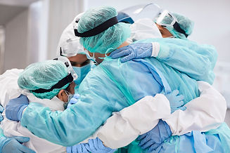 NHSOS Website Image Group of Health Care Practioners in Huddle.jpg