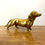 Thumbnail: Antique brass Dachshund