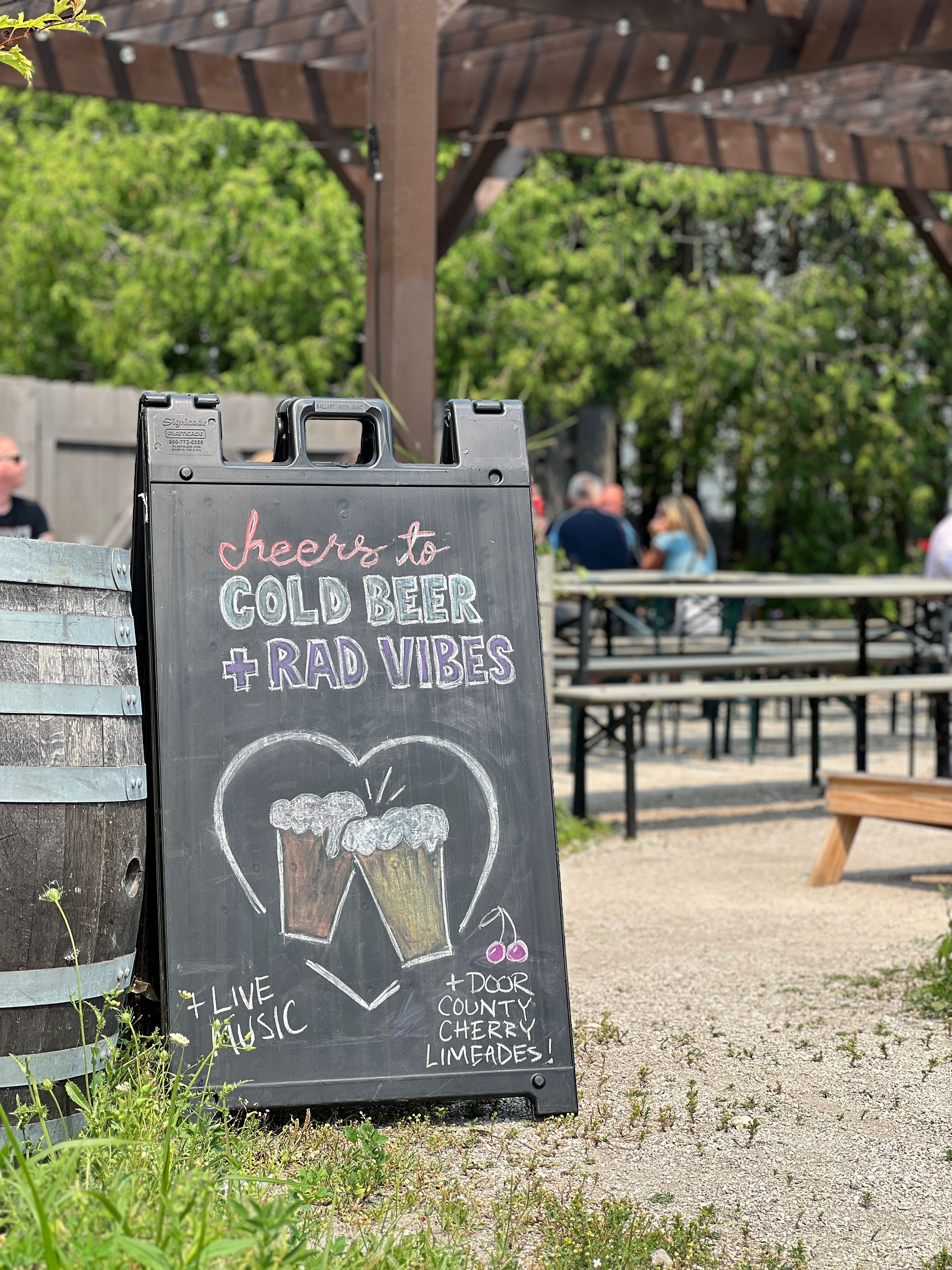 hand-drawn chalkboard outside at Door County Brewing Company