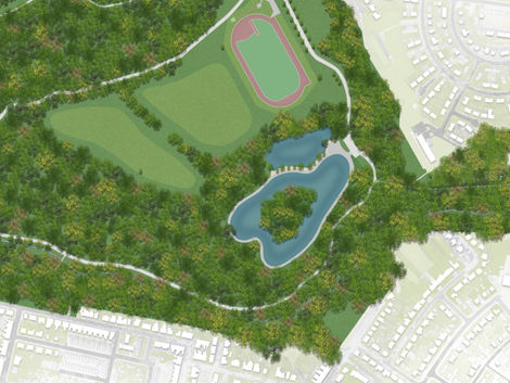 Overhead view of a park with sports fields, water bodies, and landscape design.
