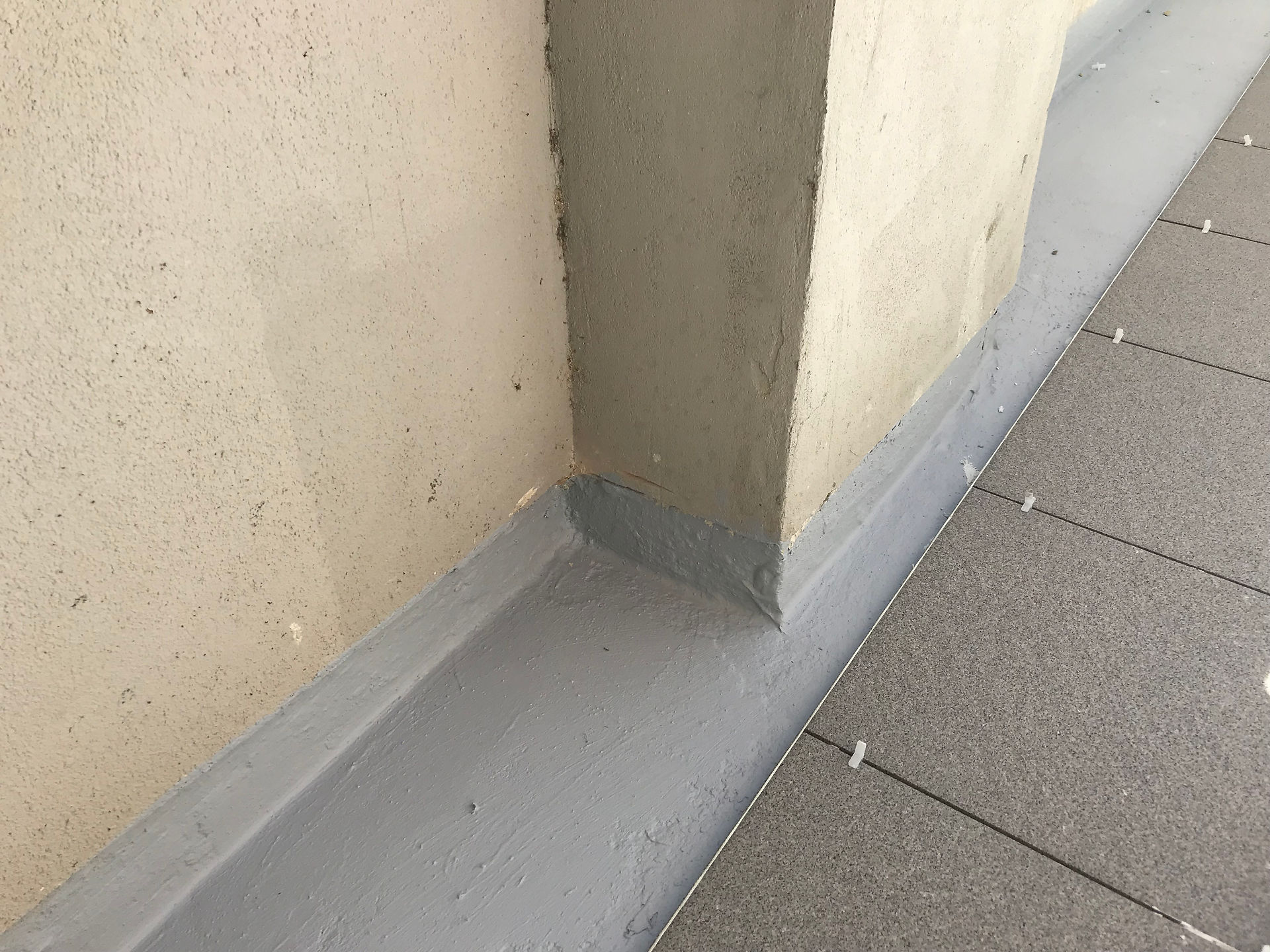 The floor surface of this office and residential complex has been waterproofed and re-tiled to stop the development of concrete cancer