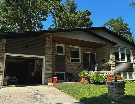 Full exterior renovation with aluminum wood grain siding Royal Cedar renditions in Welland