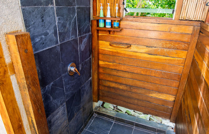 Beachfront Bure shower under the stars bathroom at Barefoot Manta Island Resort Fiji.