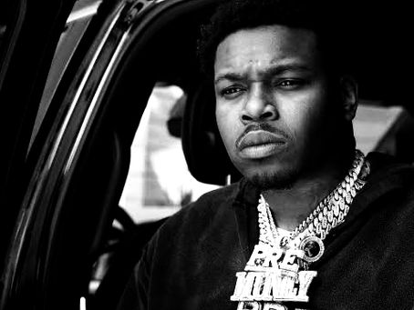 Kenny Muney Rhymes in the Rain and Sets His Problems Ablaze in "Don't Worry About Me," the Latest Video From Muney Talk 2