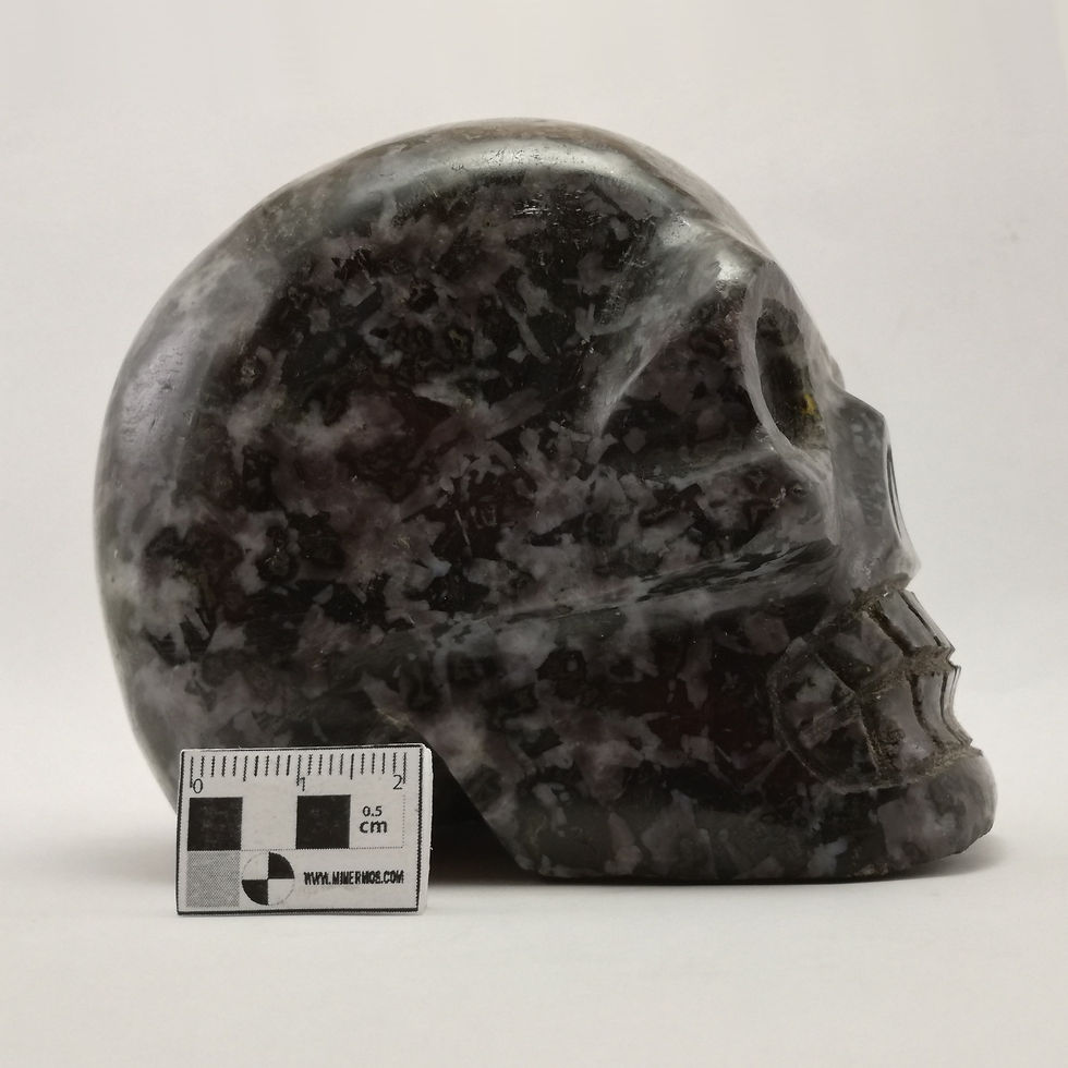 Miniatura: caveiras em pedra